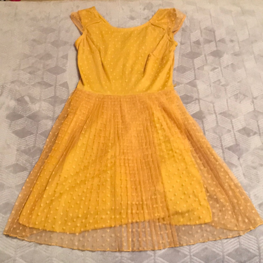A mustard color dress